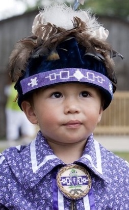 Seneca boy in traditional outfit